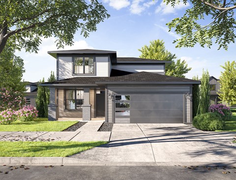 a home with a gray and white exterior and a black garage door